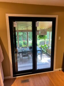 Beautifully designed patio door from EcoTech Windows & Doors, enhancing indoor-outdoor flow and natural light in the home.