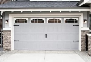 Modern garage door with a sleek design, enhancing the curb appeal and functionality of a home during summer renovations.