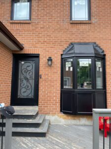 Black on black windows and doors from EcoTech add a sleek and modern touch to your home, enhancing natural light and energy efficiency for a stylish summer refresh.