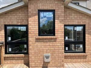 Stylish black windows installed by EcoTech Windows and Doors, enhancing the curb appeal and energy efficiency of a Mississauga home.