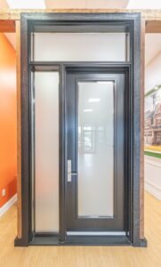 Elegant black EcoTech High Performance Entry Way Door System with decorative doorglass, offering superior strength, energy efficiency, and security.