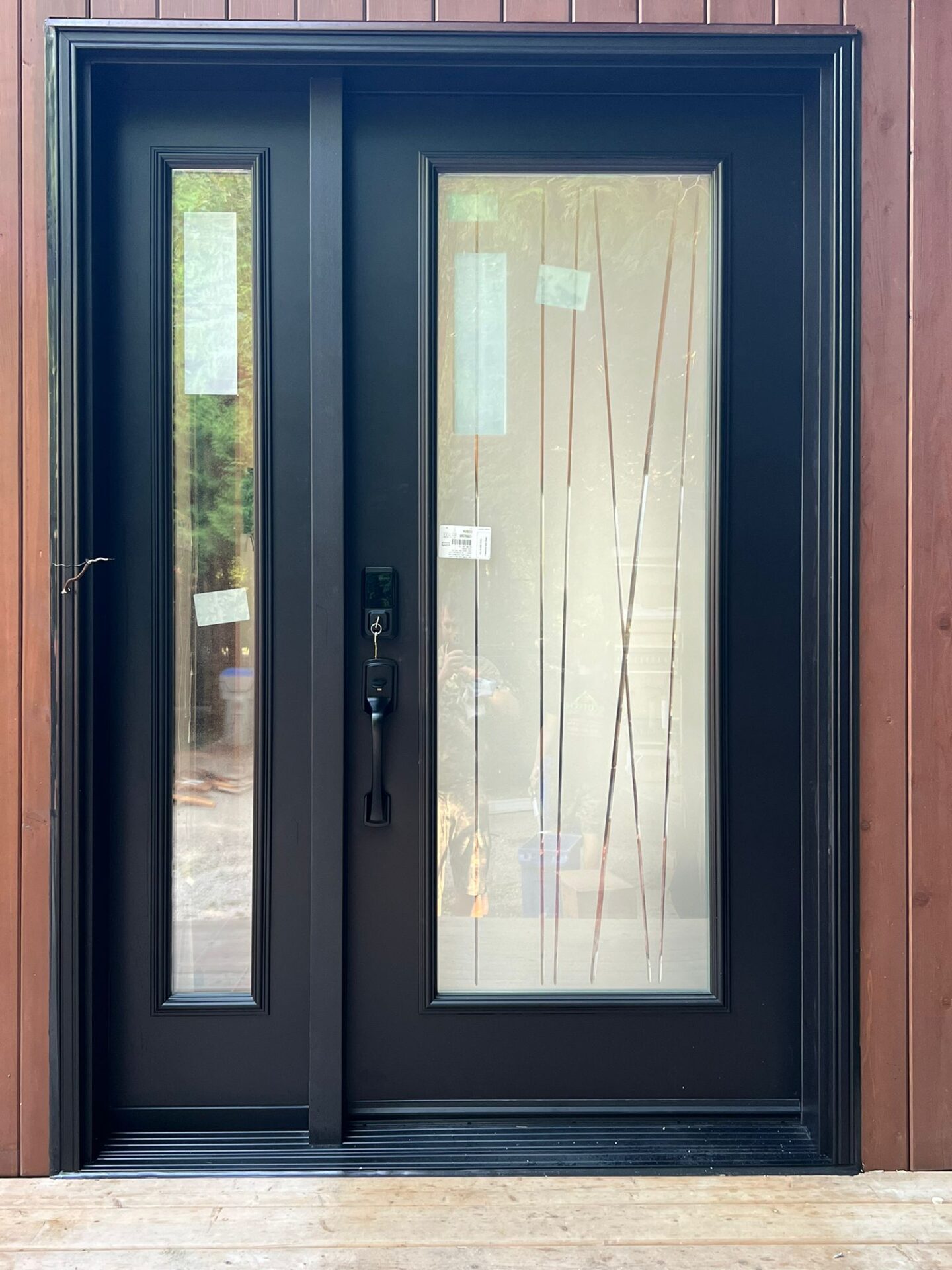 Close-up of a modern fiberglass door featuring a sleek finish and stylish design, showcasing its durability and aesthetic appeal.