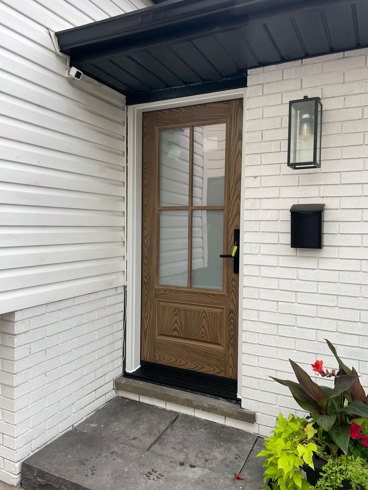 Brown doors featuring a rich, warm finish that adds a classic and inviting look to any entryway.