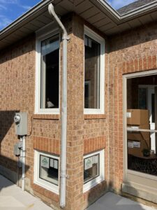 Corner wall featuring new windows installed by EcoTech Windows and Doors, enhancing natural light and aesthetic appeal.