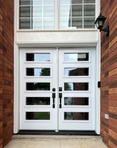 EcoTech fiberglass door with decorative glass inserts and a robust frame, designed for both durability and aesthetics