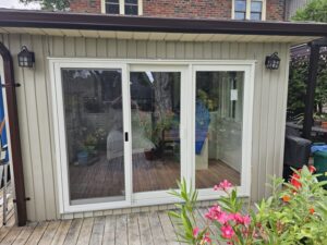 Stylish patio door with EcoSmart Low-E glass, offering a seamless transition between indoor and outdoor spaces.