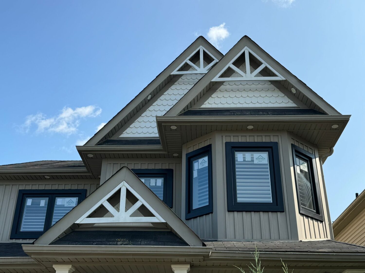 Sleek black-framed windows installed in a Mississauga home, offering a modern look with energy-efficient glass and durable construction.