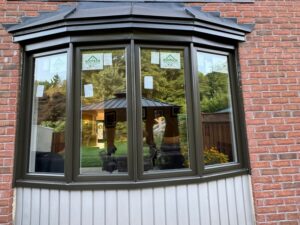 A beautiful bay window installed by EcoTech, the best window company in Etobicoke, enhancing the home's curb appeal and providing ample natural light.