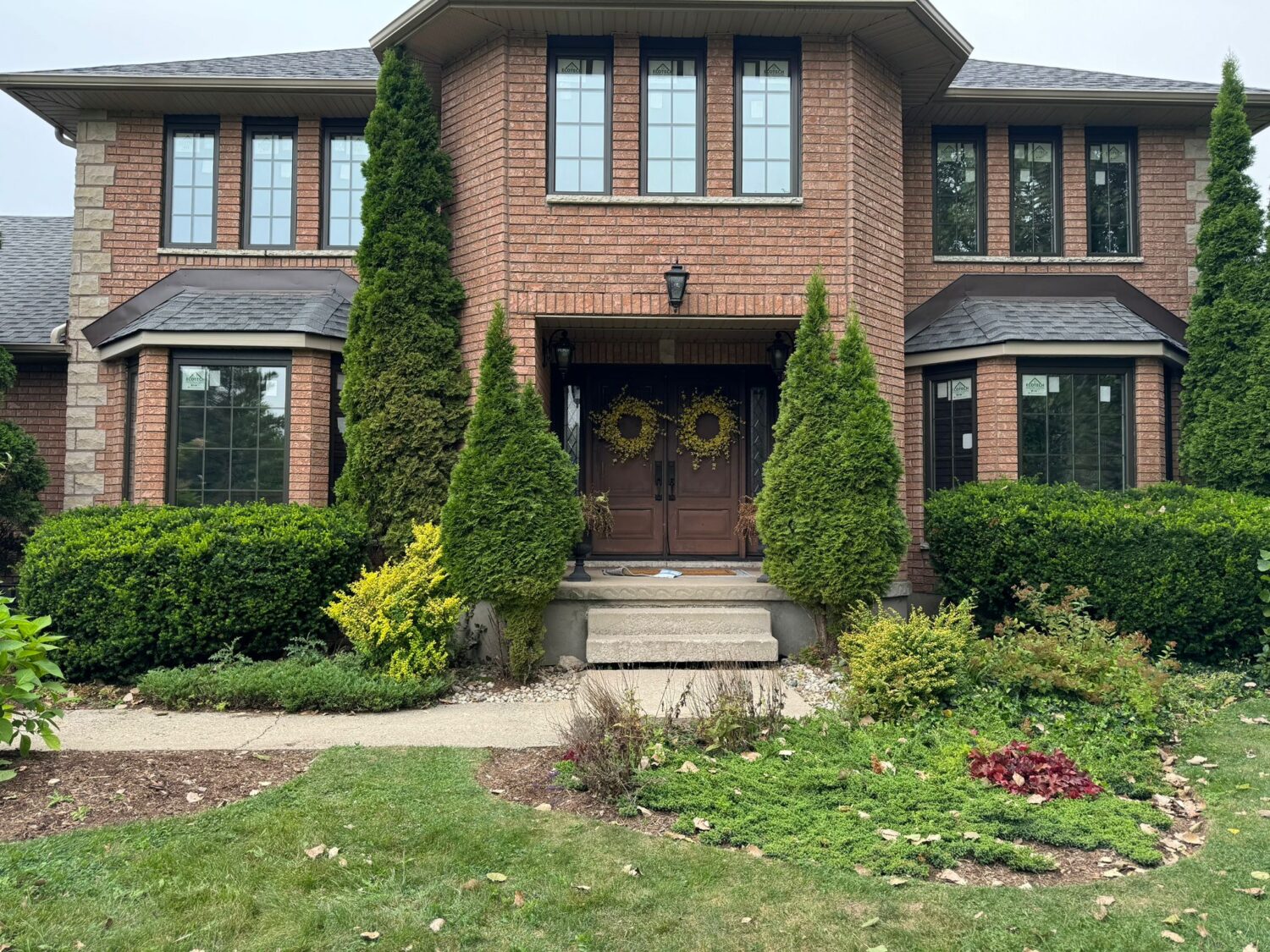 Black windows installed in a Toronto home by EcoTech Windows & Doors, featuring a sleek, modern design that enhances the home's aesthetic appeal.